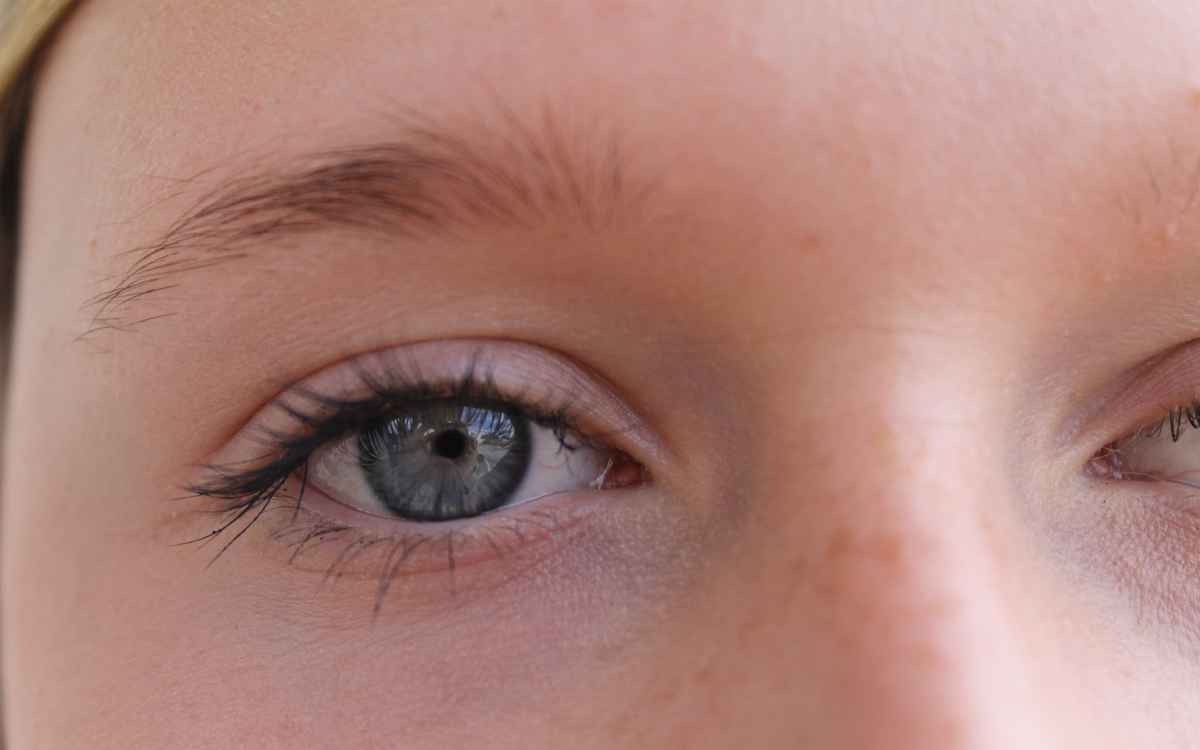closeup of an eye with gray iris