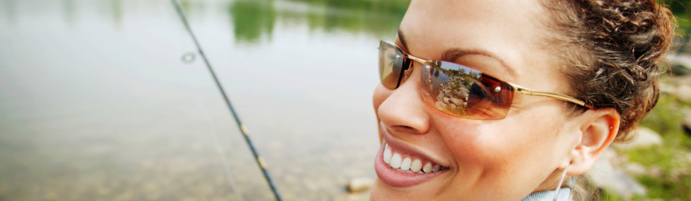 woman wears polarized sunglasses for fishing