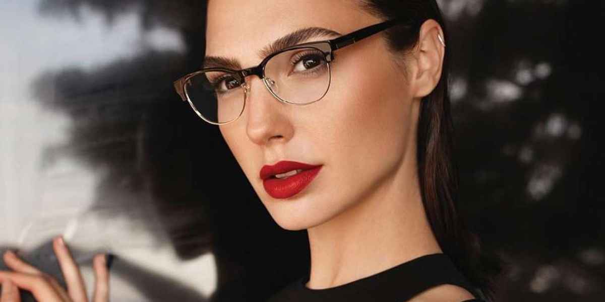 Gal Gadot wears round-based browline frames with red lips