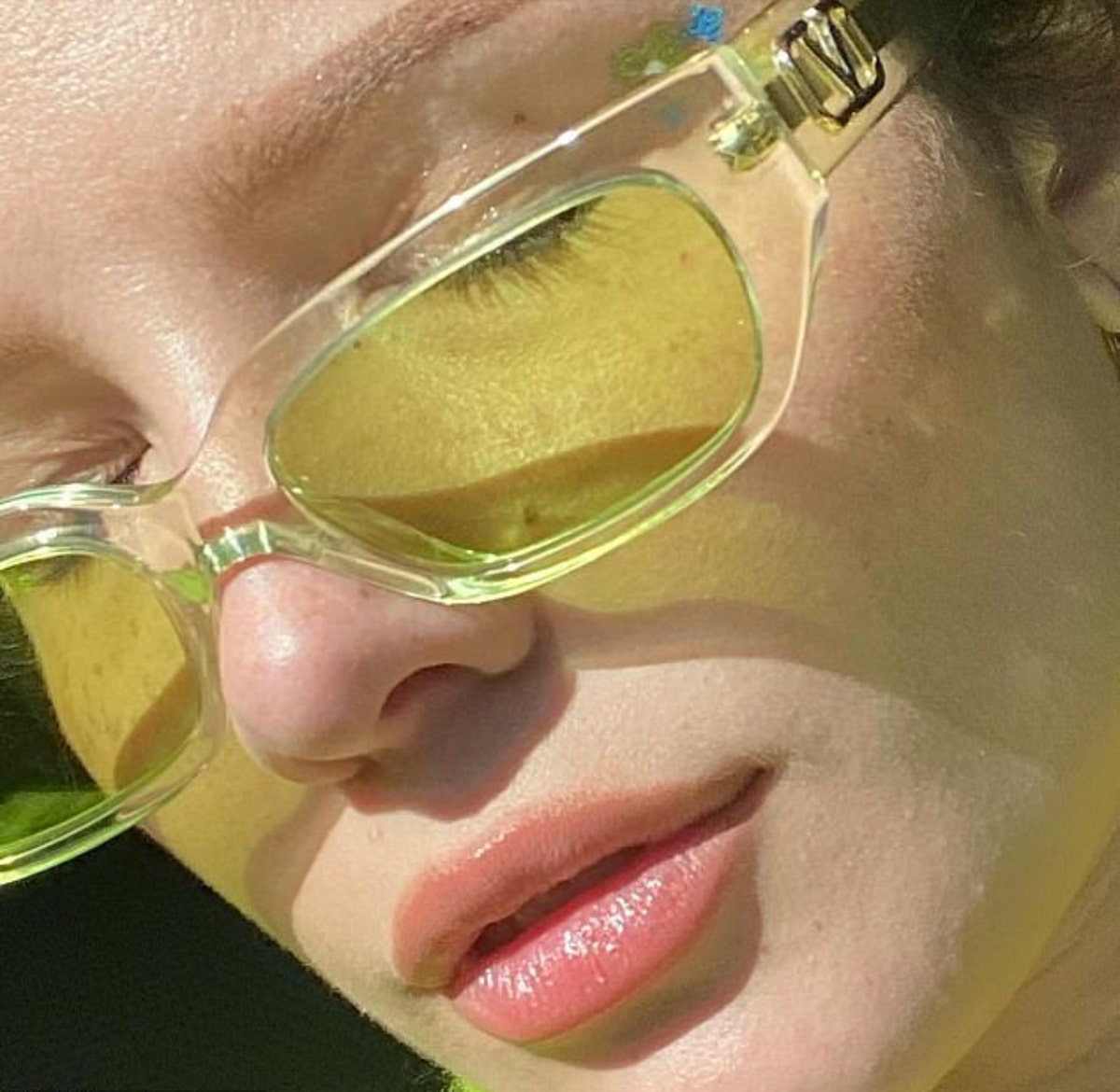 halsey wears transparent green glasses