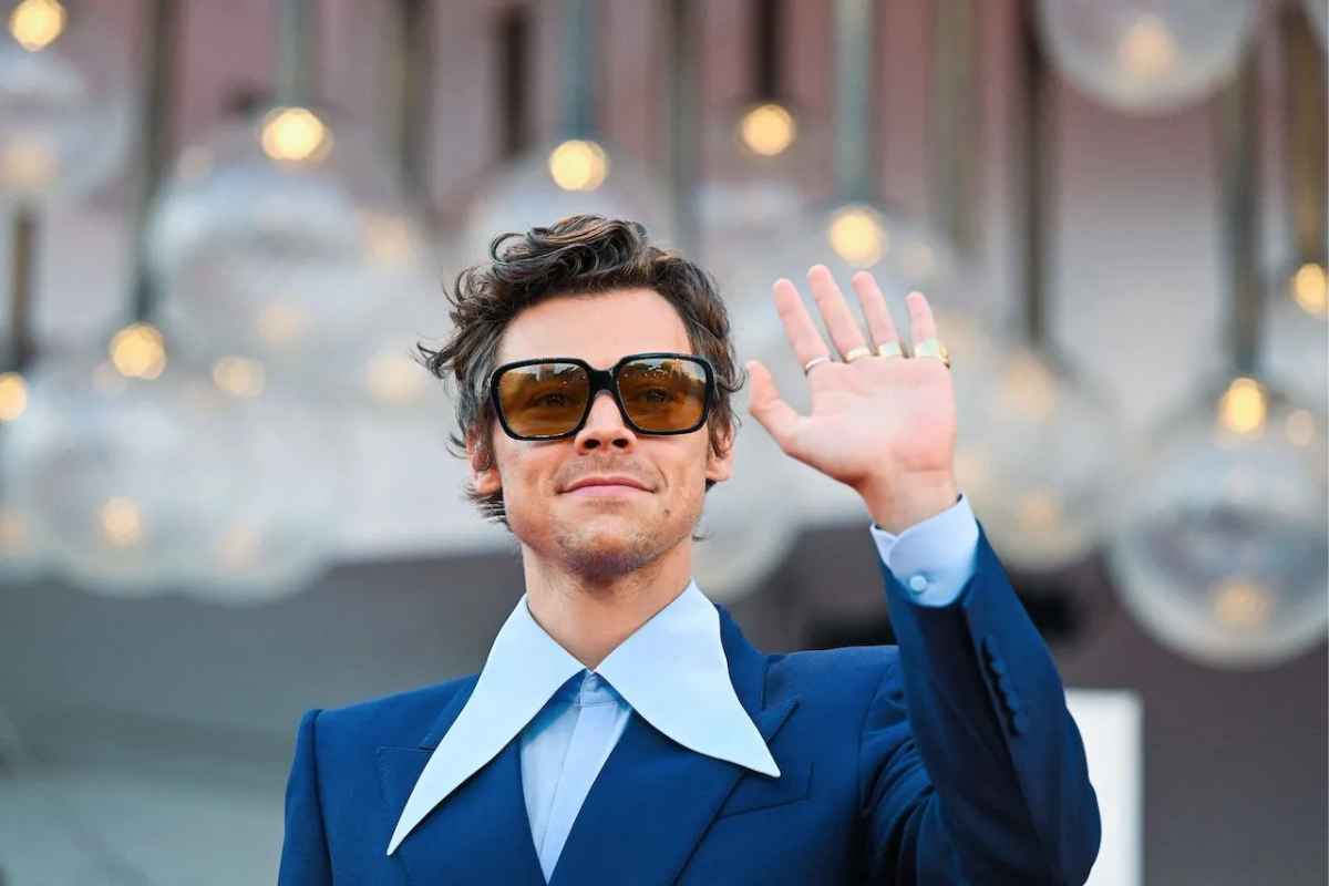 Harry Styles at the 2022 Venice Film Festival wearing square oversized glasses with yellow-tinted lenses