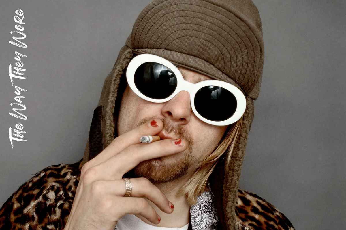 kurt cobain wears white oval sunglasses in a photoshoot