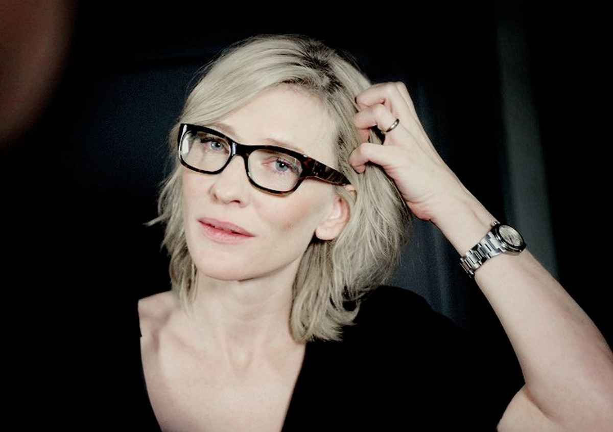 Cate Blanchett wears black glasses for a minimalist chic style