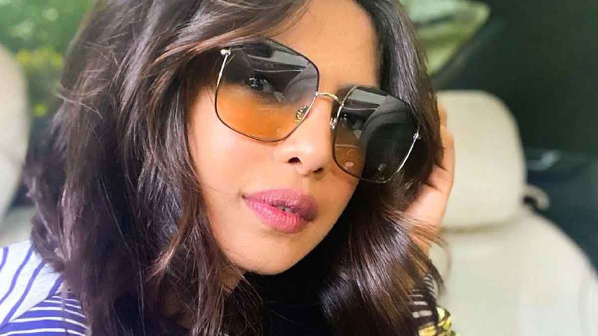 Priyanka Chopra wears gradient glasses with clean and minimal makeup