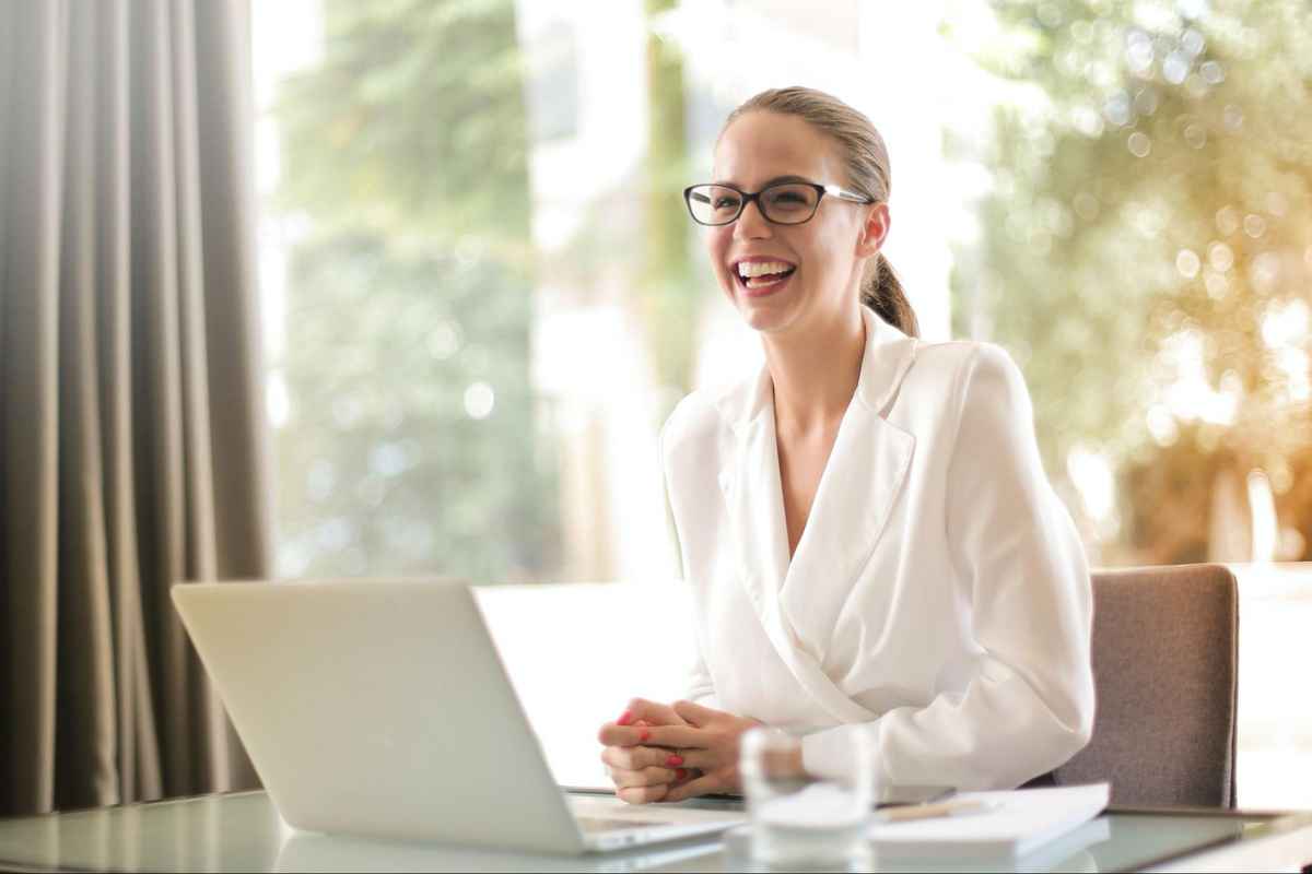 woman exudes professionalism while wearing black glasses