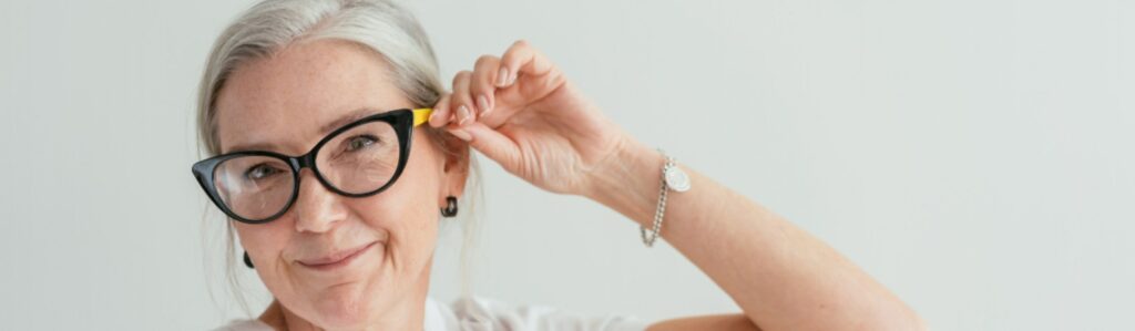 old woman wears stylish cat eye glasses