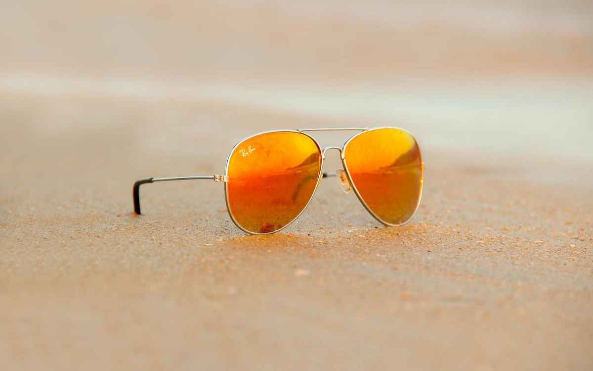 Properly washing sunglasses after sand or saltwater exposure to prevent lens scratches and residue buildup.