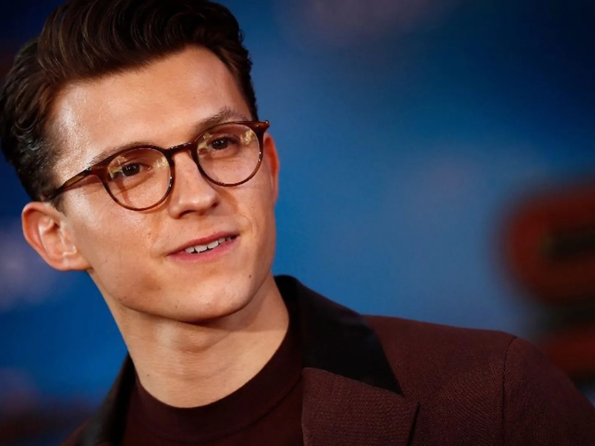 tom holland in subtle tortoiseshell glasses