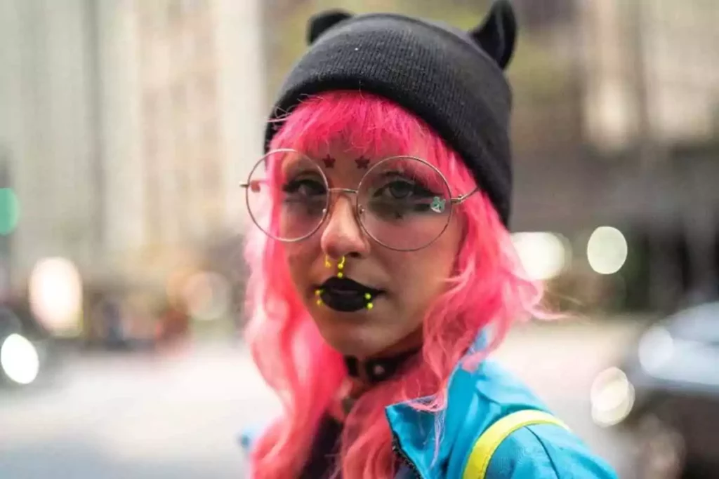 woman wears oversized glasses for the e-girl aesthetic