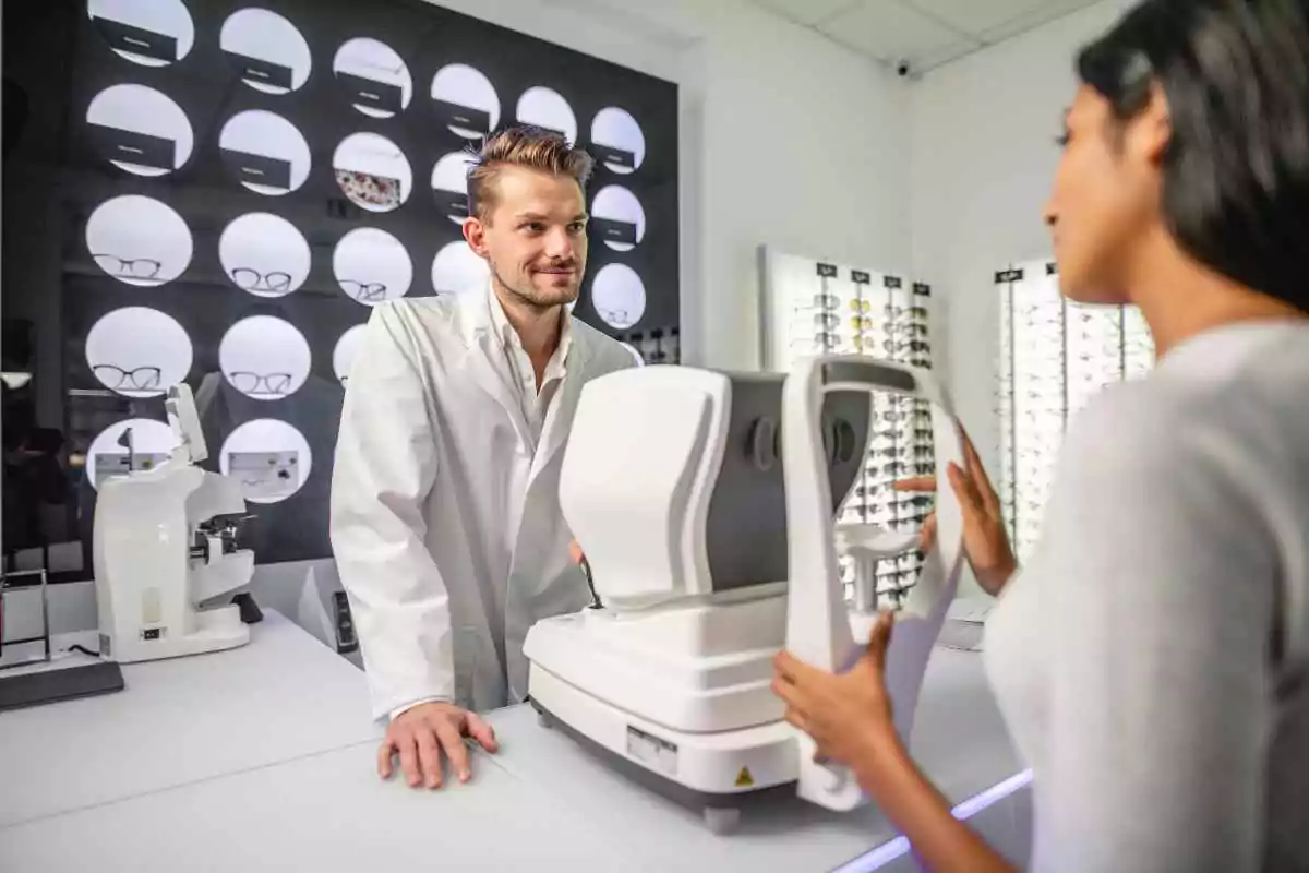 eye doctor consulting a customer on which contact lenses to get