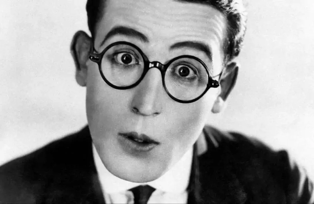 Harold Lloyd wears horn-rimmed glasses
