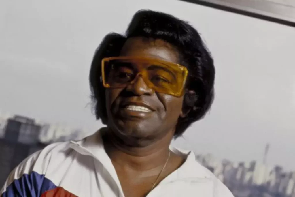 james brown wears funky glasses