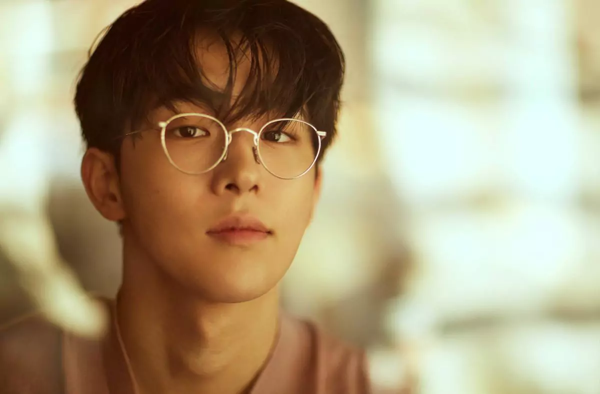 nam joo hyuk wears wire frame glasses that flatter his small face