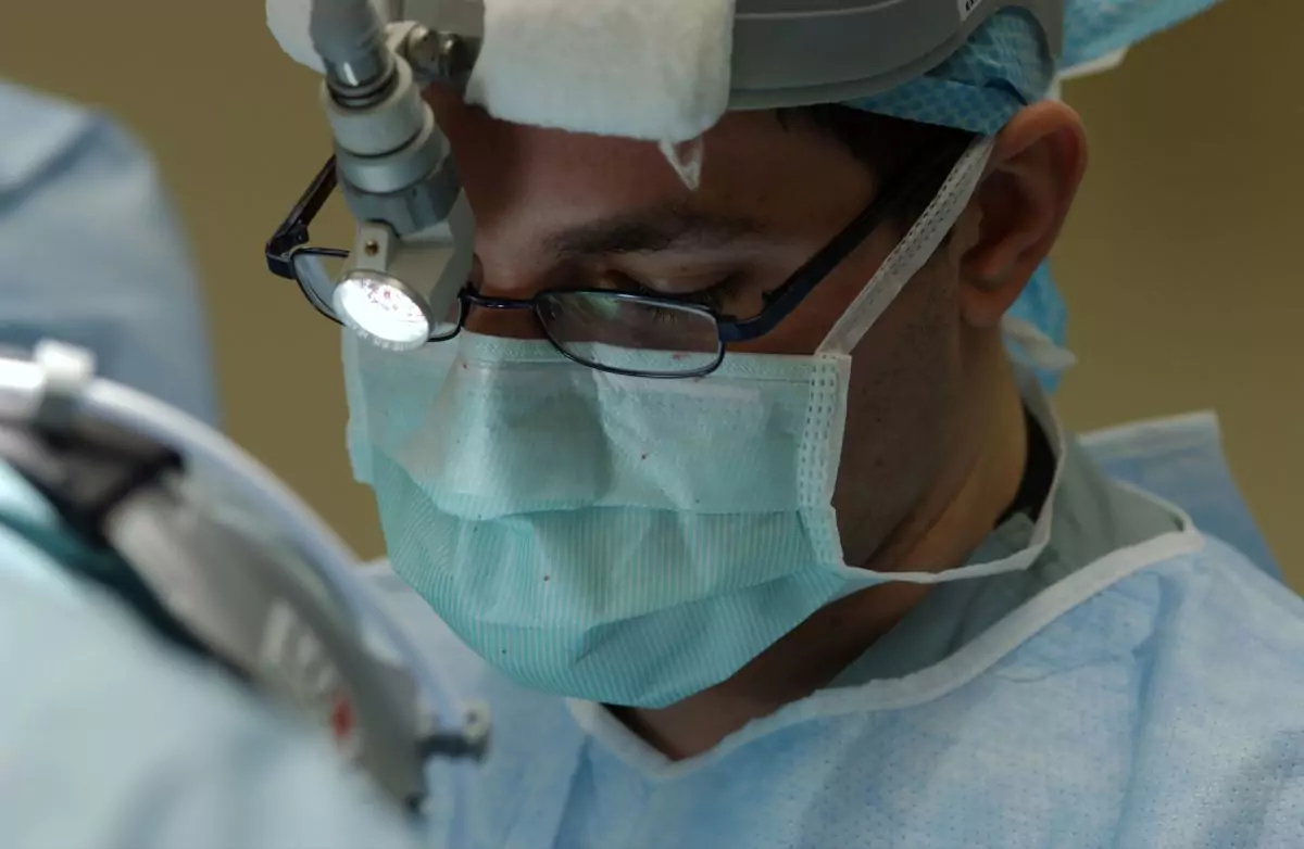 oculoplastic surgeon performing a surgery