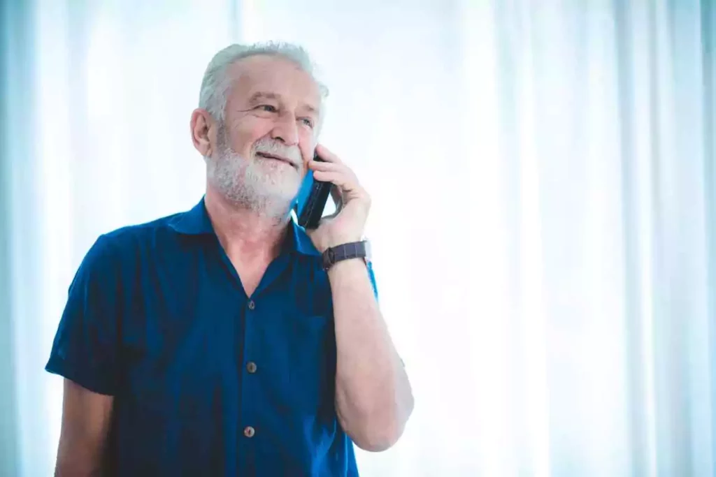 patient having a teleoptometry on the phone with his eye doctor